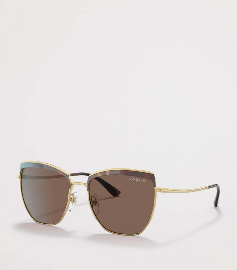 Vogue metal irregular sunglasses with oversized cat-eye design, UK version