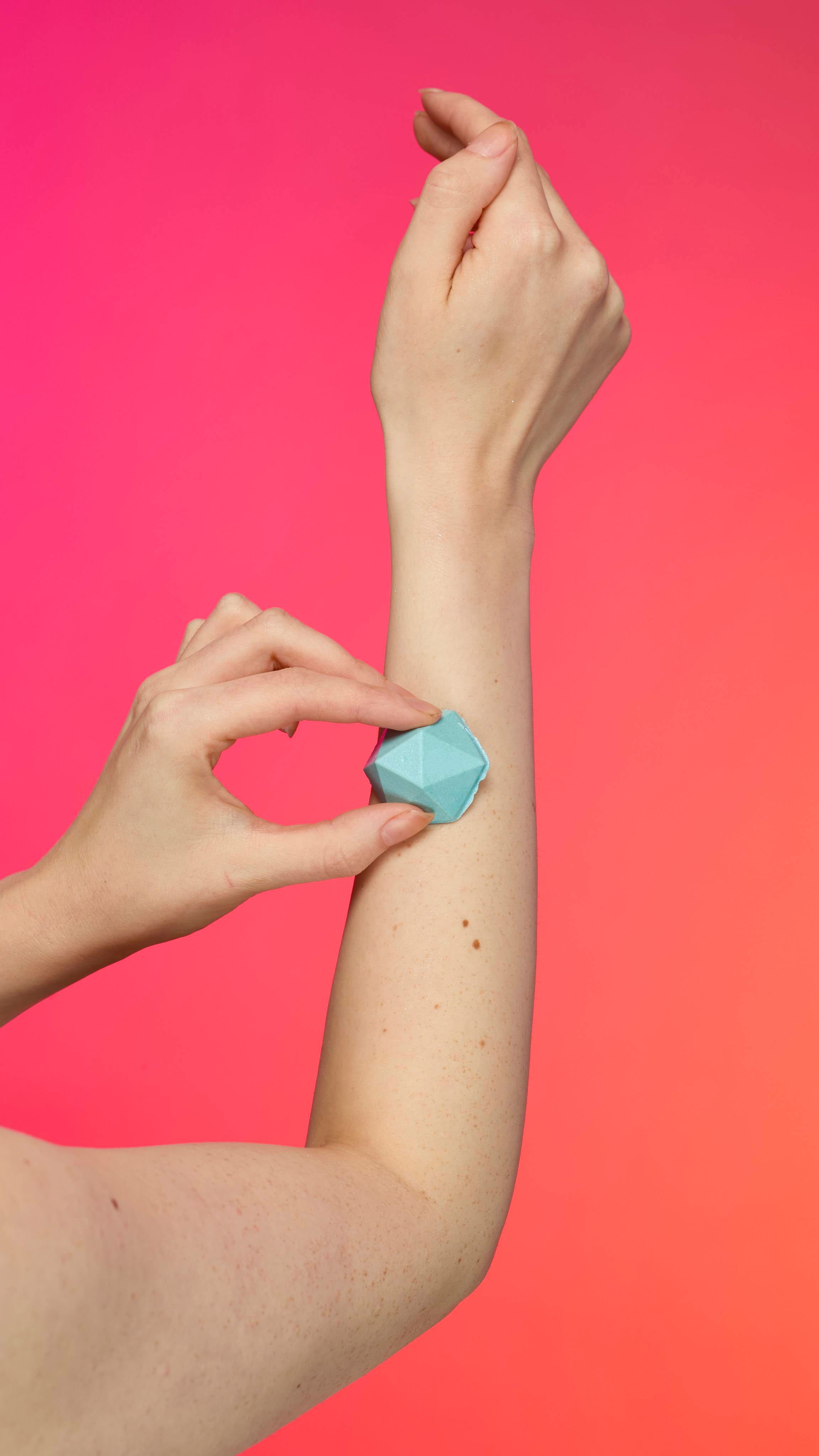 Lush Blue Glitterbug body shimmer bar with blue sparkle, UK version