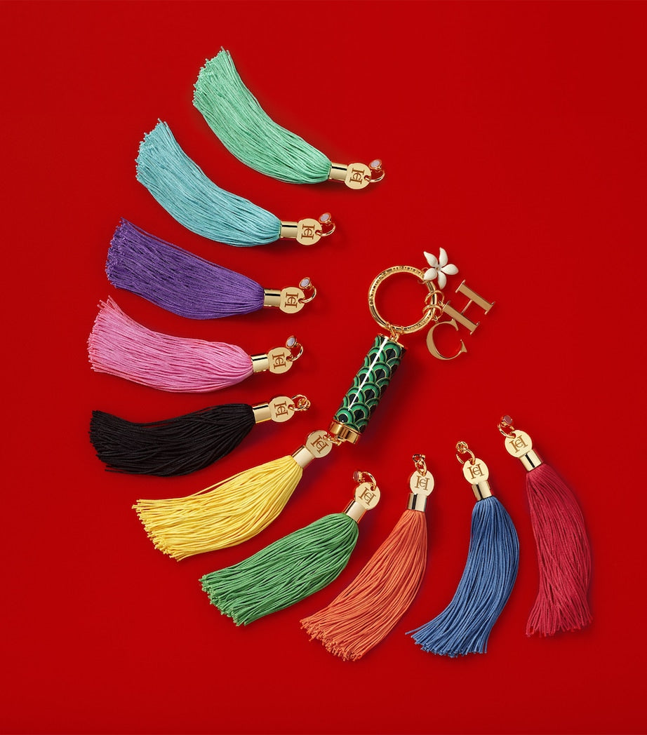 Carolina Herrera lipstick case with tassel charm - British product