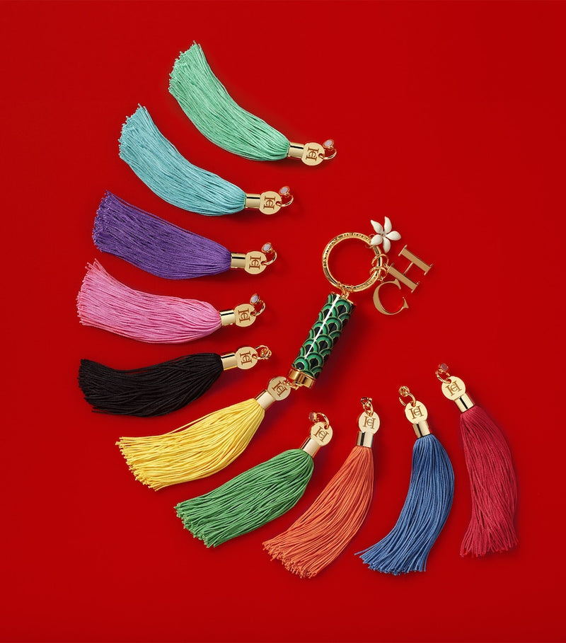 Carolina Herrera lipstick case with tassel charm - British product