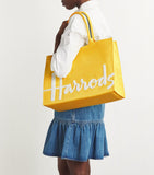 Harrods large cotton logo tote bag in vibrant yellow, UK version