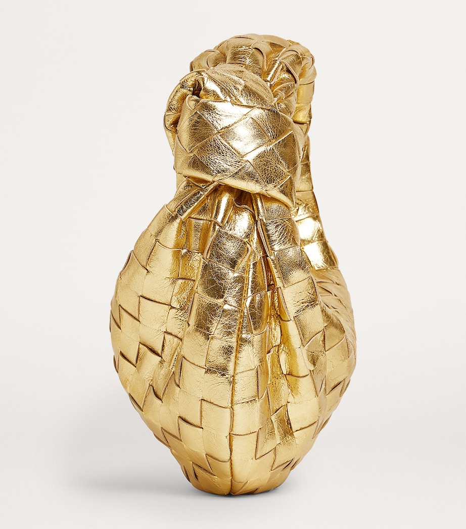 Bottega Veneta mini metallic leather top-handle bag, imported from the UK