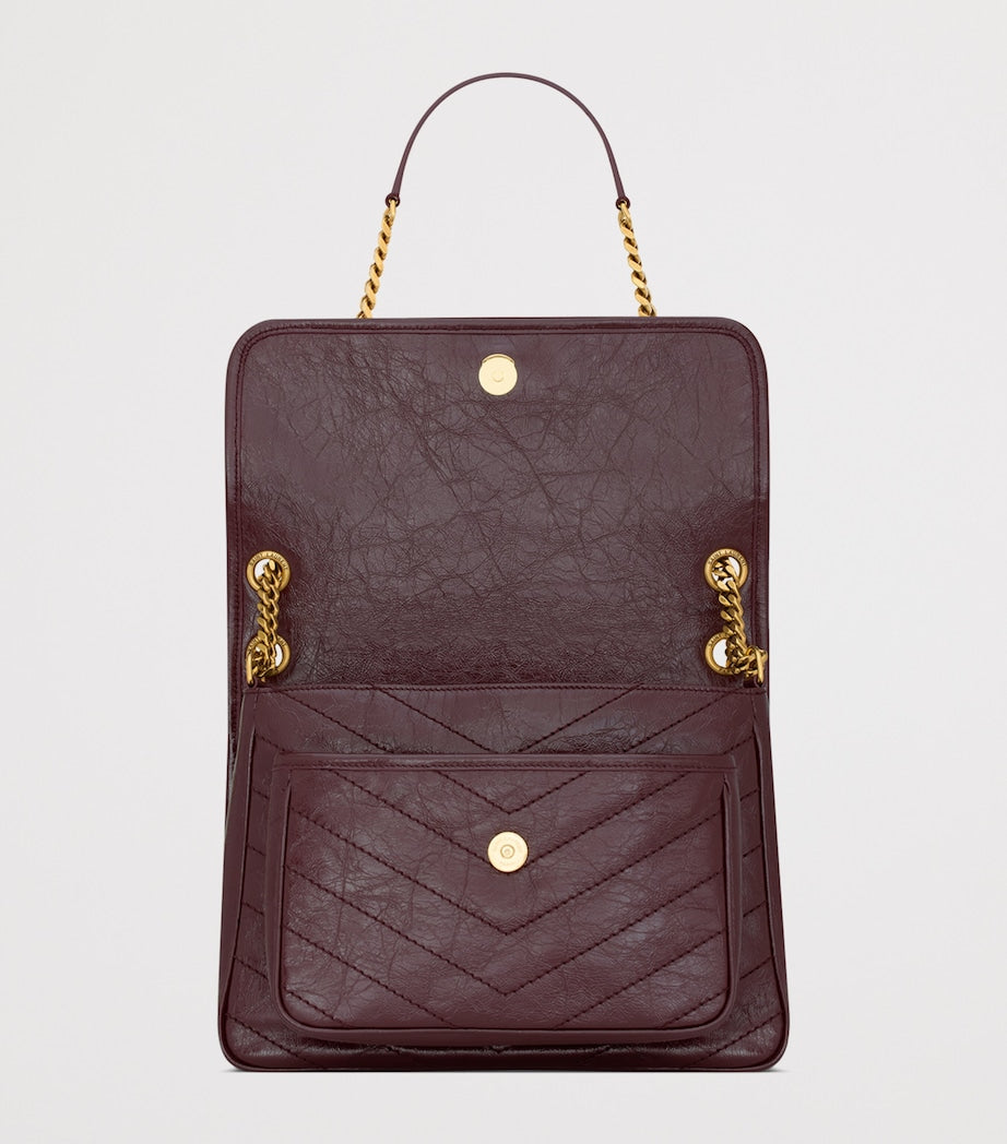 Saint Laurent Niki medium leather shoulder bag, British product