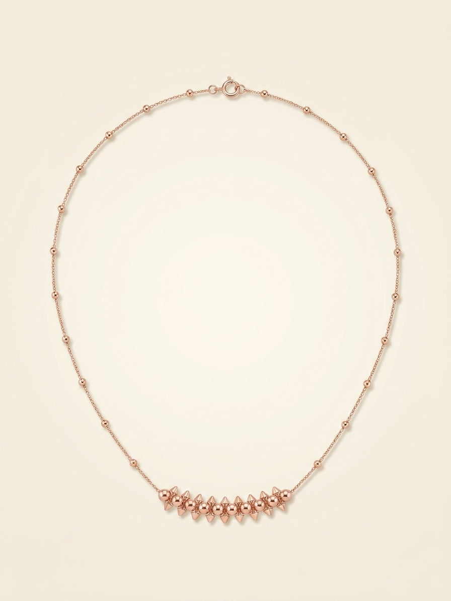 Cartier Clash necklace in 18ct rose gold with pink chalcedony (British brand)