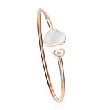 Chopard rose gold diamond mother-of-pearl Happy Hearts bracelet, UK version
