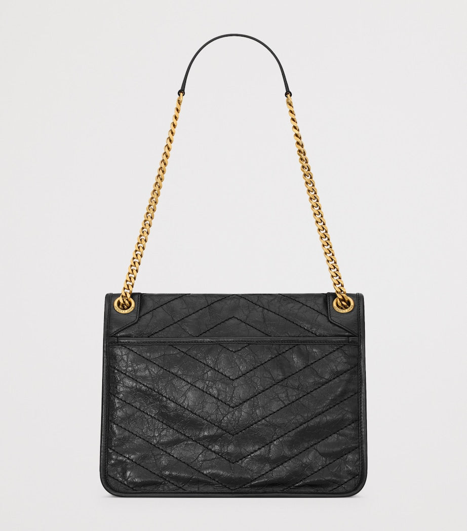 Saint Laurent Niki medium shoulder bag in textured calfskin (British brand)