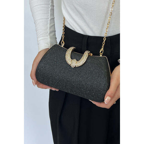 Schwarze Glitzer-Kupplungstasche mit goldener Hardware und Kettenband (britische Marke)
