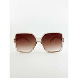 SVNX oversized square sunglasses in crystal sand, imported from the UK