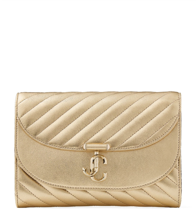 Jimmy Choo Curve clutch bag in metallic leather, imported from the UK