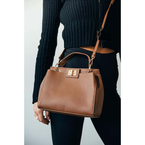 SVNX brown faux leather handbag with gold trim, imported from the UK