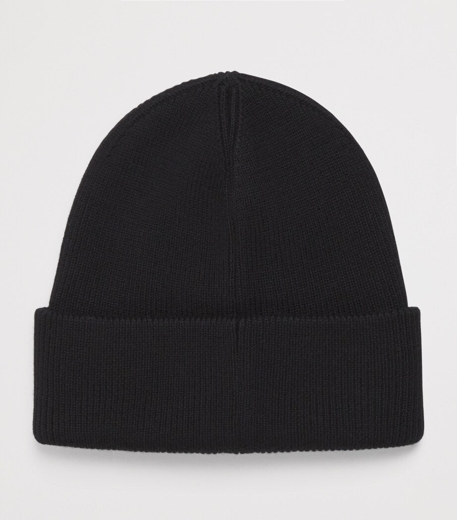 Moose Knuckles children's wool knit beanie with metal logo, imported from the UK