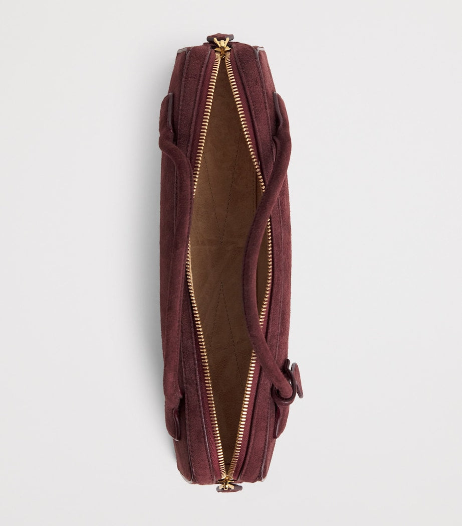 Alaïa Le Teckel suede top-handle bag, imported from the UK