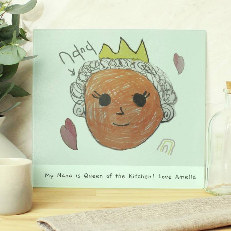 Personalised children's glass chopping board with drawing, imported from the UK