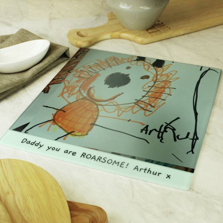 Personalised children's glass chopping board with drawing, imported from the UK