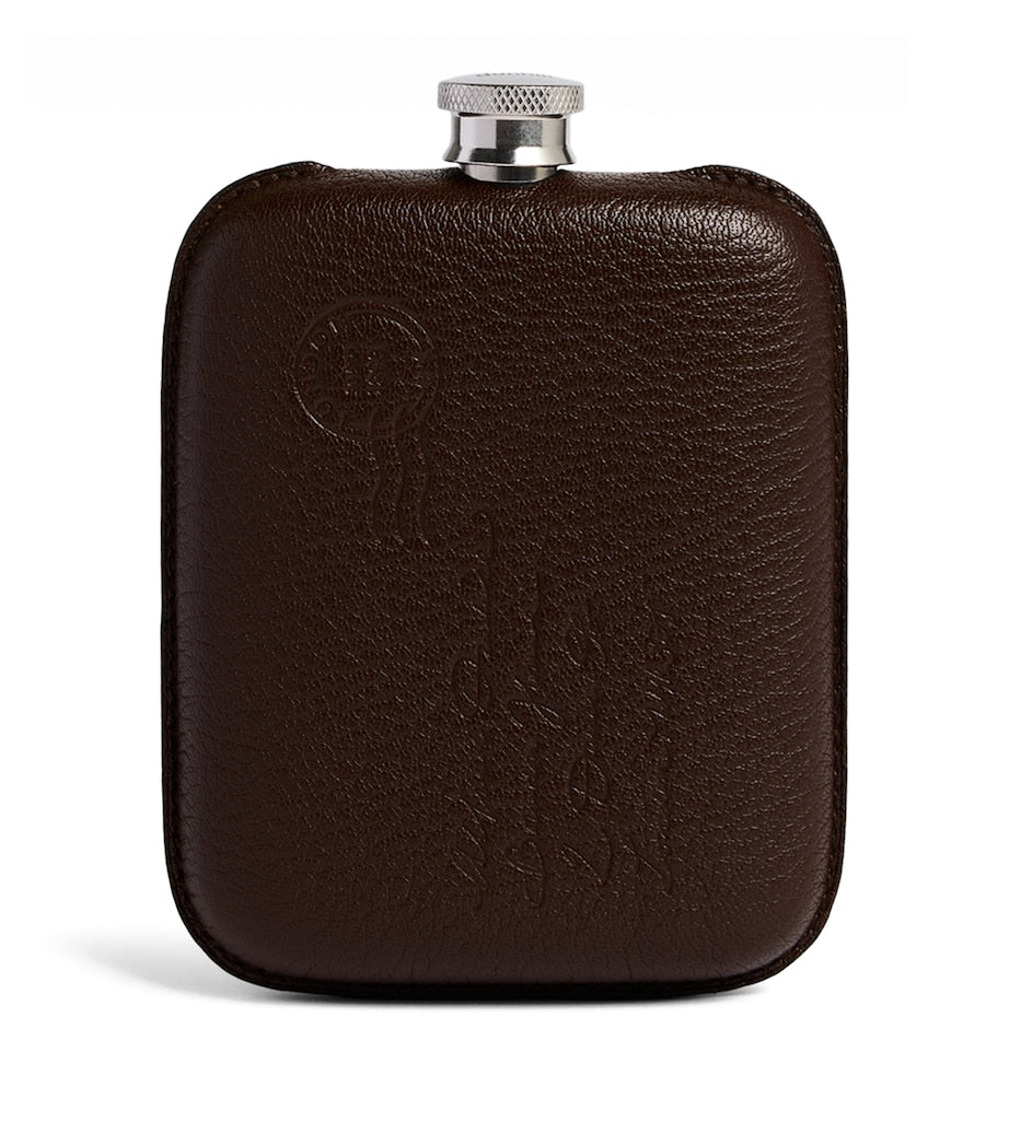 Dunhill leather-wrapped flask (British brand)