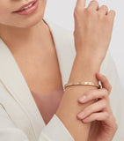 Bvlgari rose gold diamond bangle (British brand)