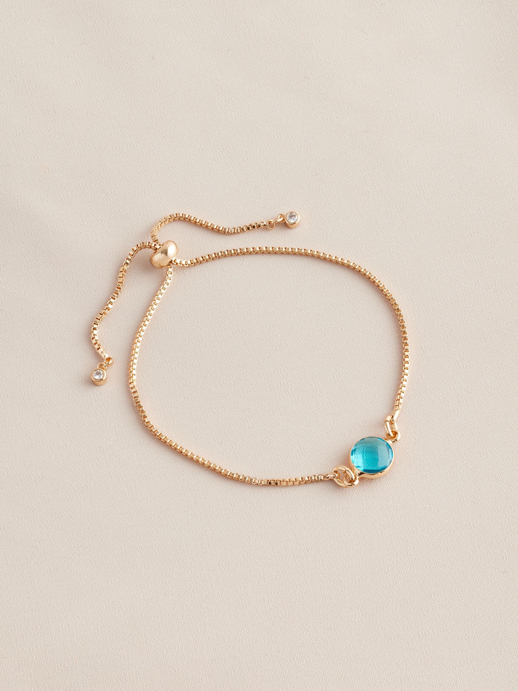 Gold tone birthstone pully bracelet, UK version