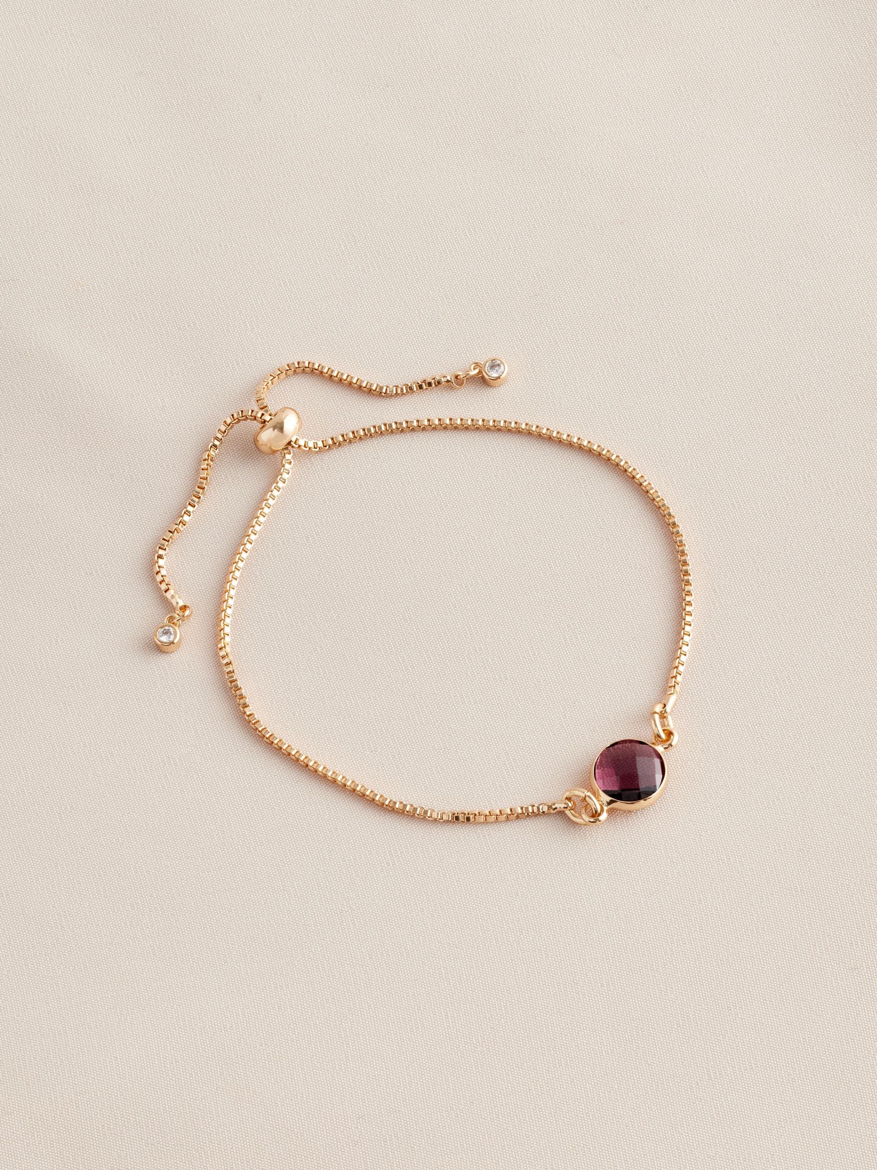 Gold tone birthstone pully bracelet, UK version