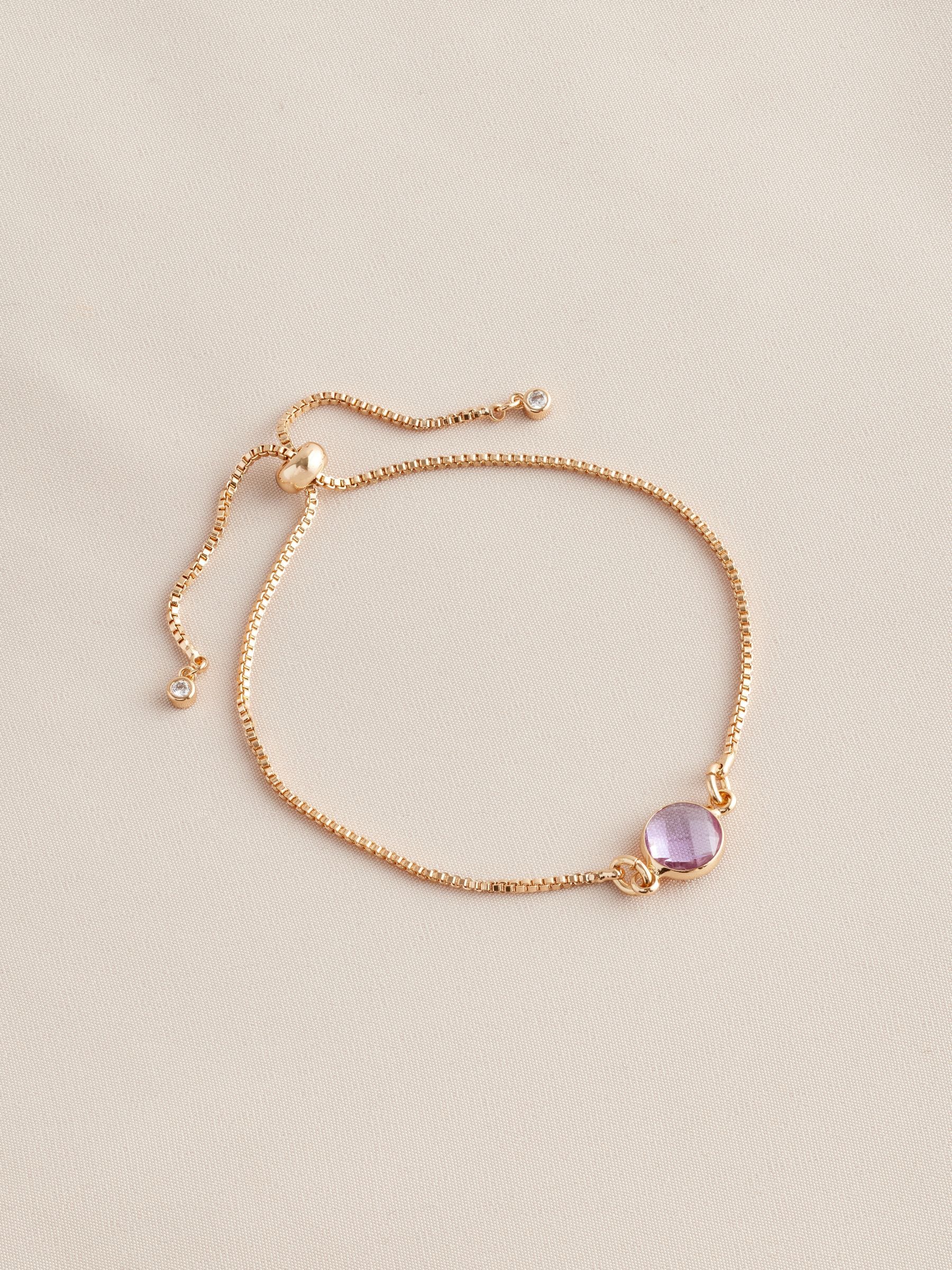 Gold tone birthstone pully bracelet, UK version