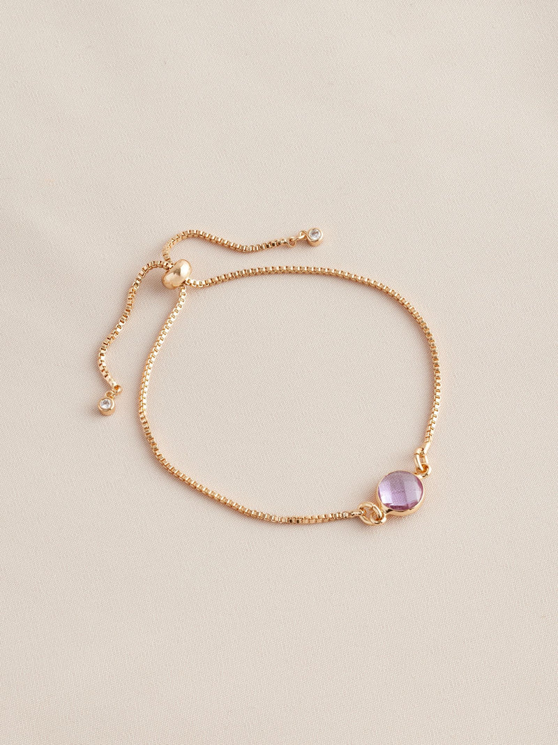 Gold tone birthstone pully bracelet, UK version