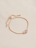 Gold tone birthstone pully bracelet, UK version