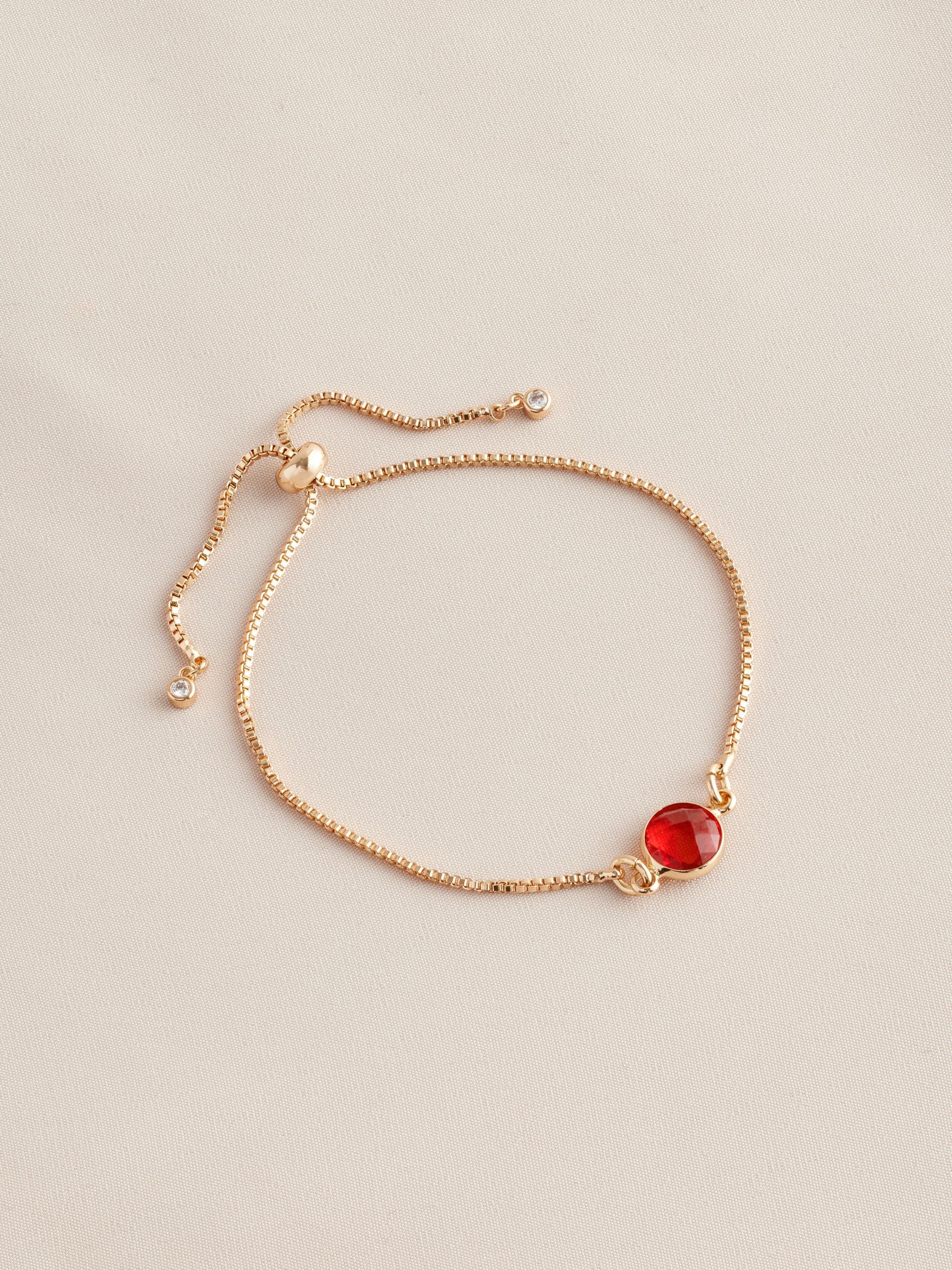 Gold tone birthstone pully bracelet, UK version