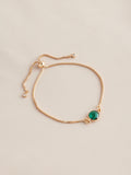 Gold tone birthstone pully bracelet, UK version