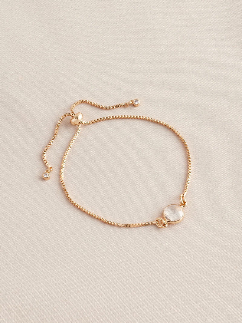 Gold tone birthstone pully bracelet, UK version