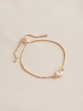 Gold tone birthstone pully bracelet, UK version