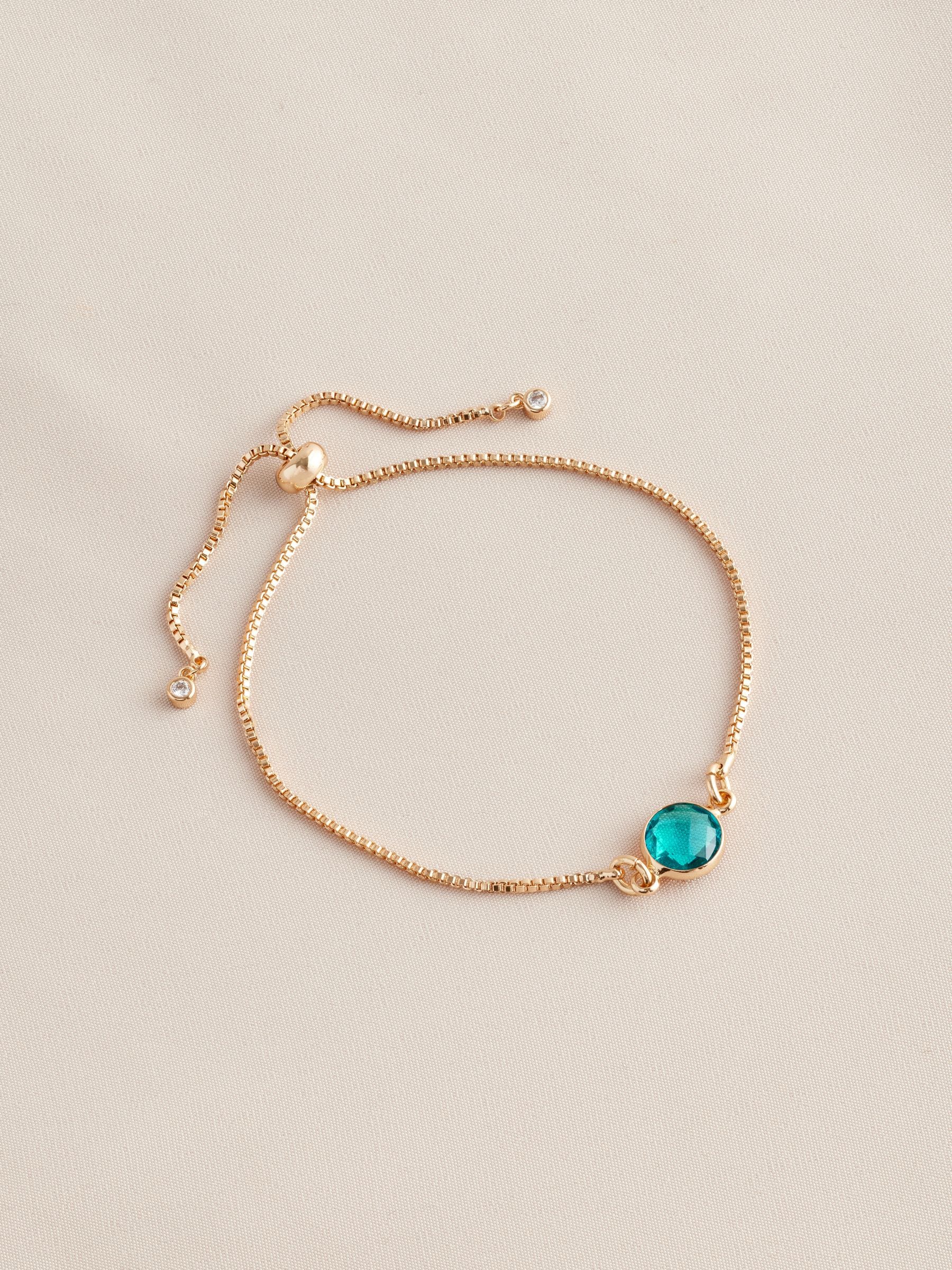 Gold tone birthstone pully bracelet, UK version