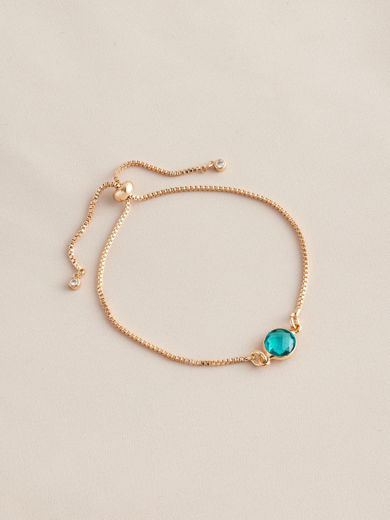 Gold tone birthstone pully bracelet, UK version