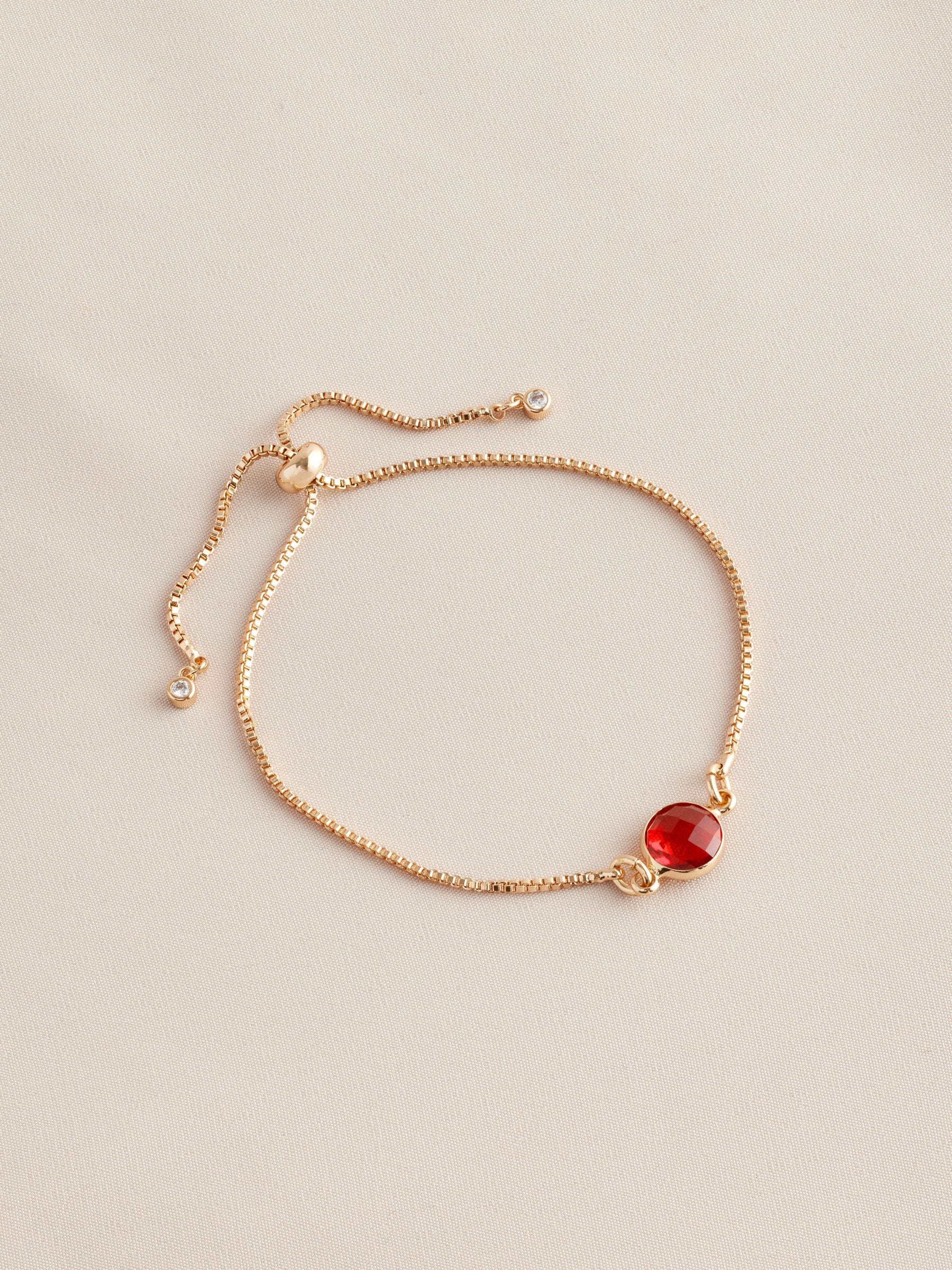 Gold tone birthstone pully bracelet, UK version