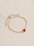 Gold tone birthstone pully bracelet, UK version