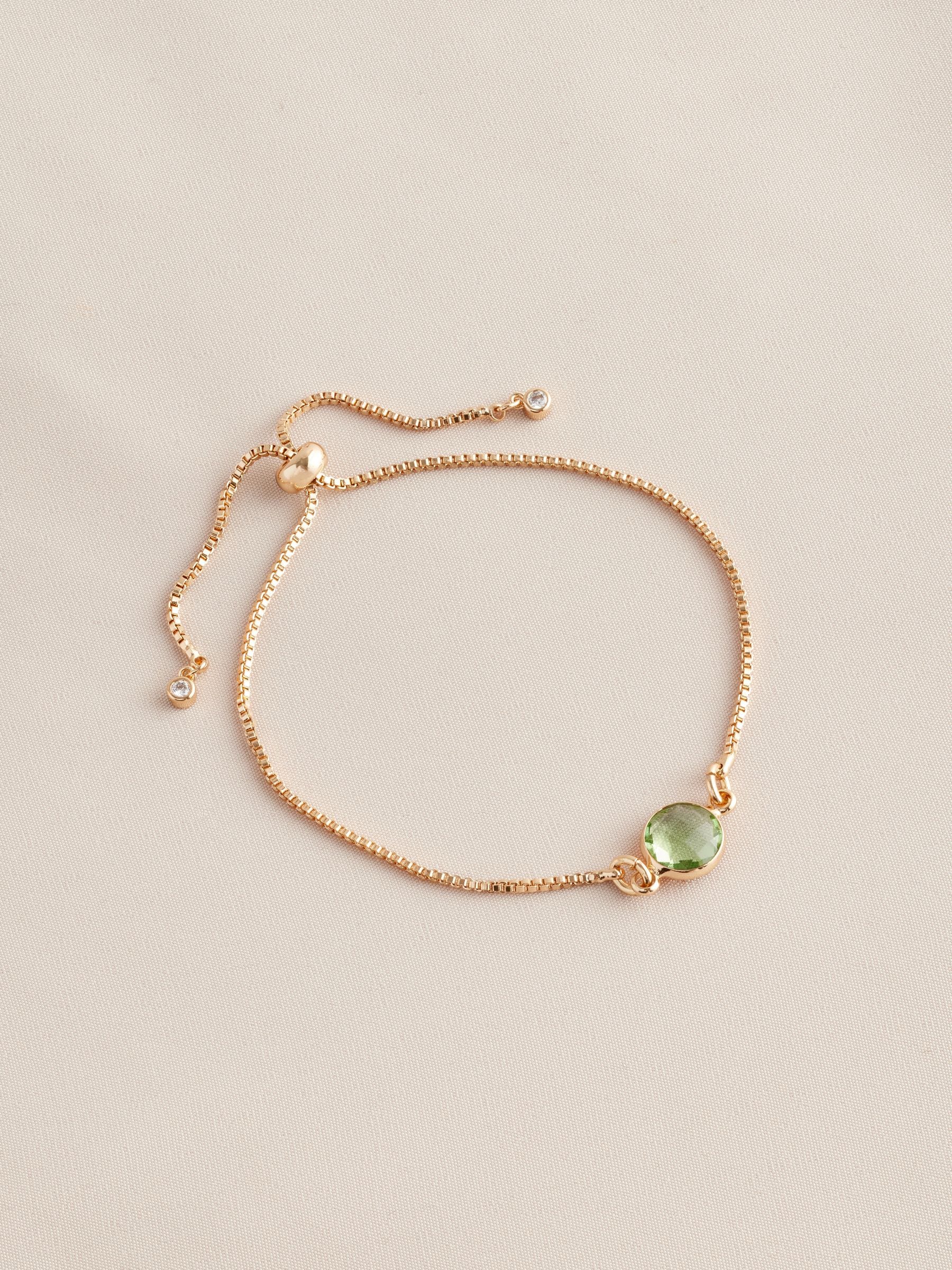 Gold tone birthstone pully bracelet, UK version