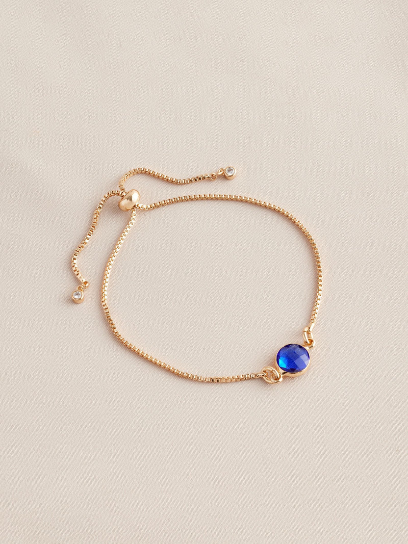 Gold tone birthstone pully bracelet, UK version