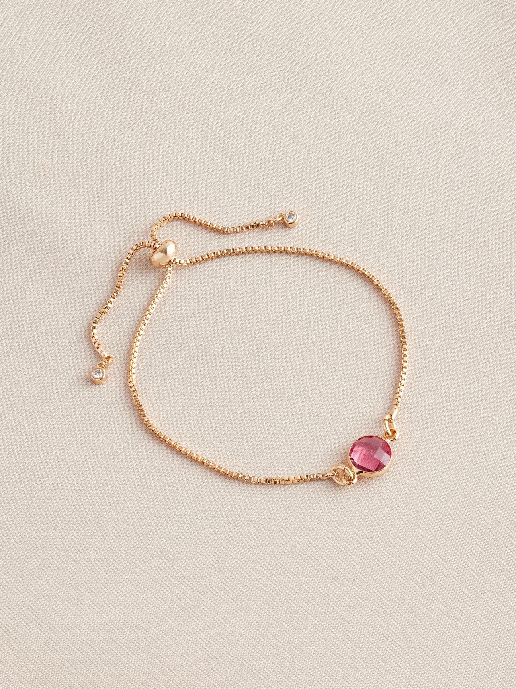Gold tone birthstone pully bracelet, UK version