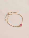 Gold tone birthstone pully bracelet, UK version