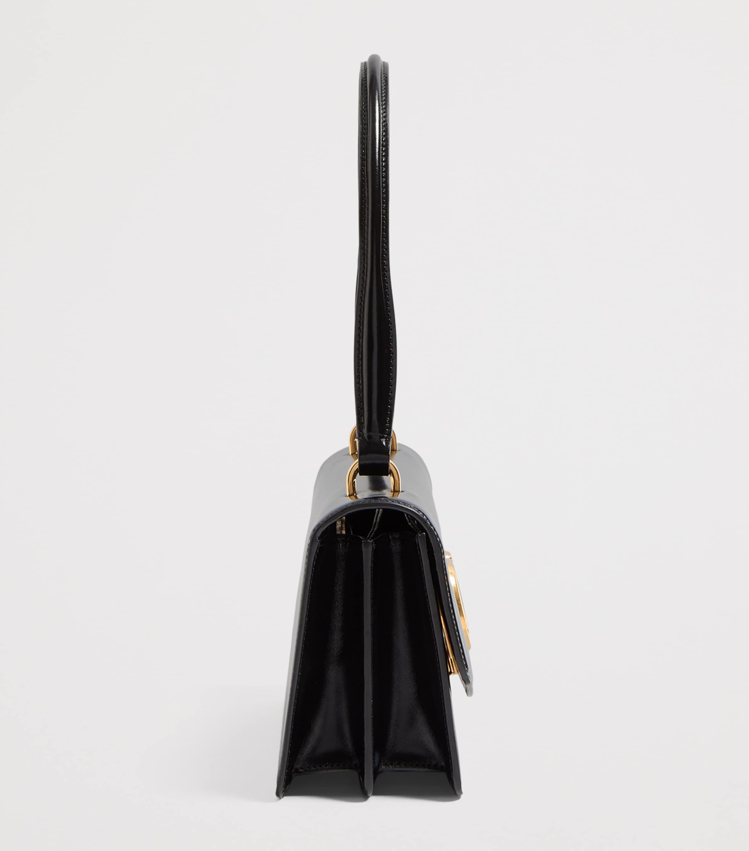 Valentino Garavani Vain top-handle leather bag, imported from the UK