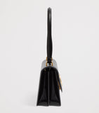 Valentino Garavani Vain top-handle leather bag, imported from the UK