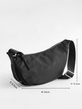 Black sling bag 30cm wide with recycled lining (British brand)