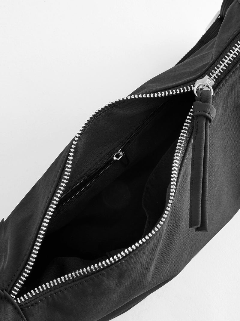 Black sling bag 30cm wide with recycled lining (British brand)