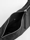 Black sling bag 30cm wide with recycled lining (British brand)