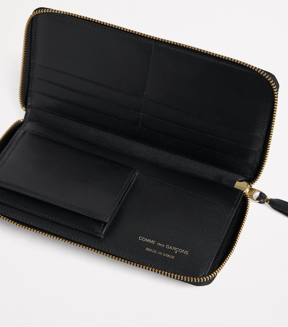 Comme des Garçons leather logo print wallet - British product