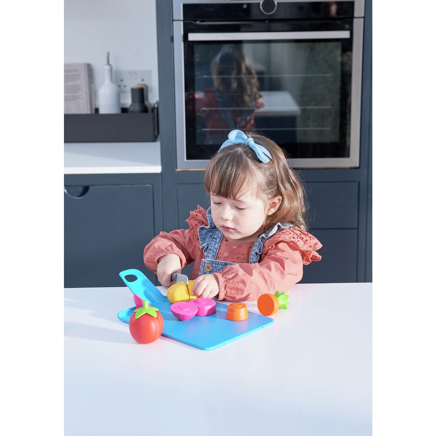 Joseph Joseph pretend play food set with chopping board (British brand)