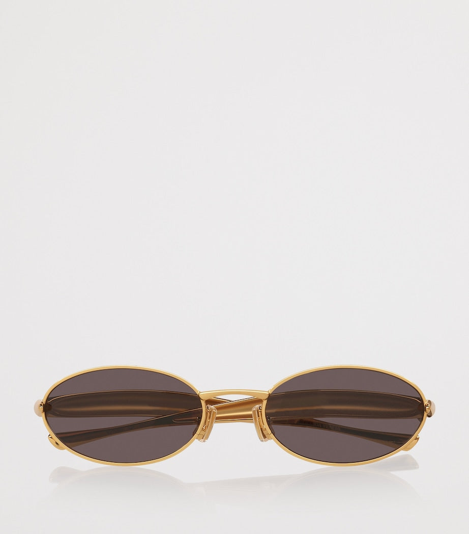 Bottega Veneta Oval Sardine Sunglasses, imported from the UK