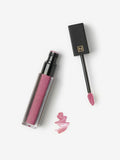 Lightly tinted pink spritz shimmer lip gloss (British brand)
