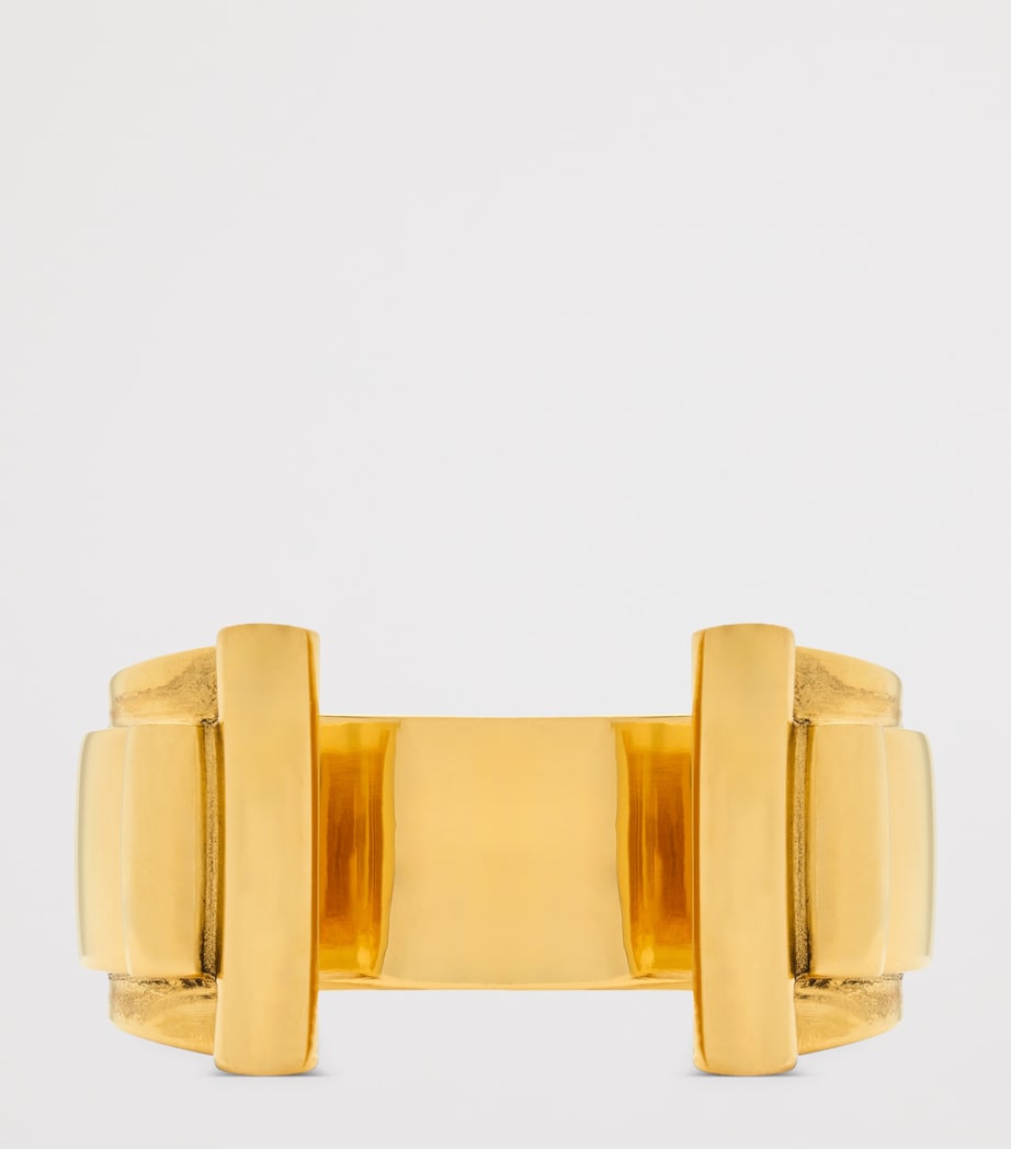 Saint Laurent Scroll Open Cuff Bracelet brass, imported from the UK