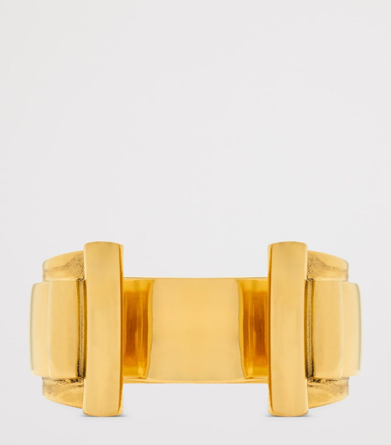 Saint Laurent Scroll Open Cuff Bracelet brass, imported from the UK