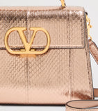 Valentino Garavani small snakeskin VSLING top-handle bag - British product