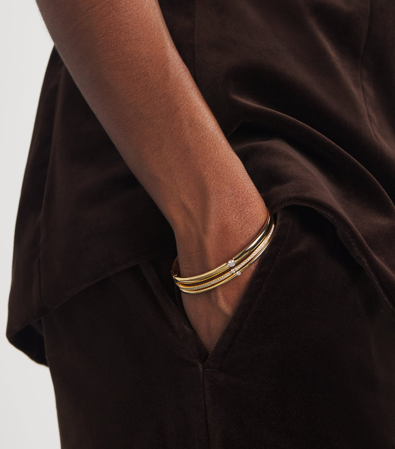Persée small yellow gold diamond Zeus bangle, imported from the UK